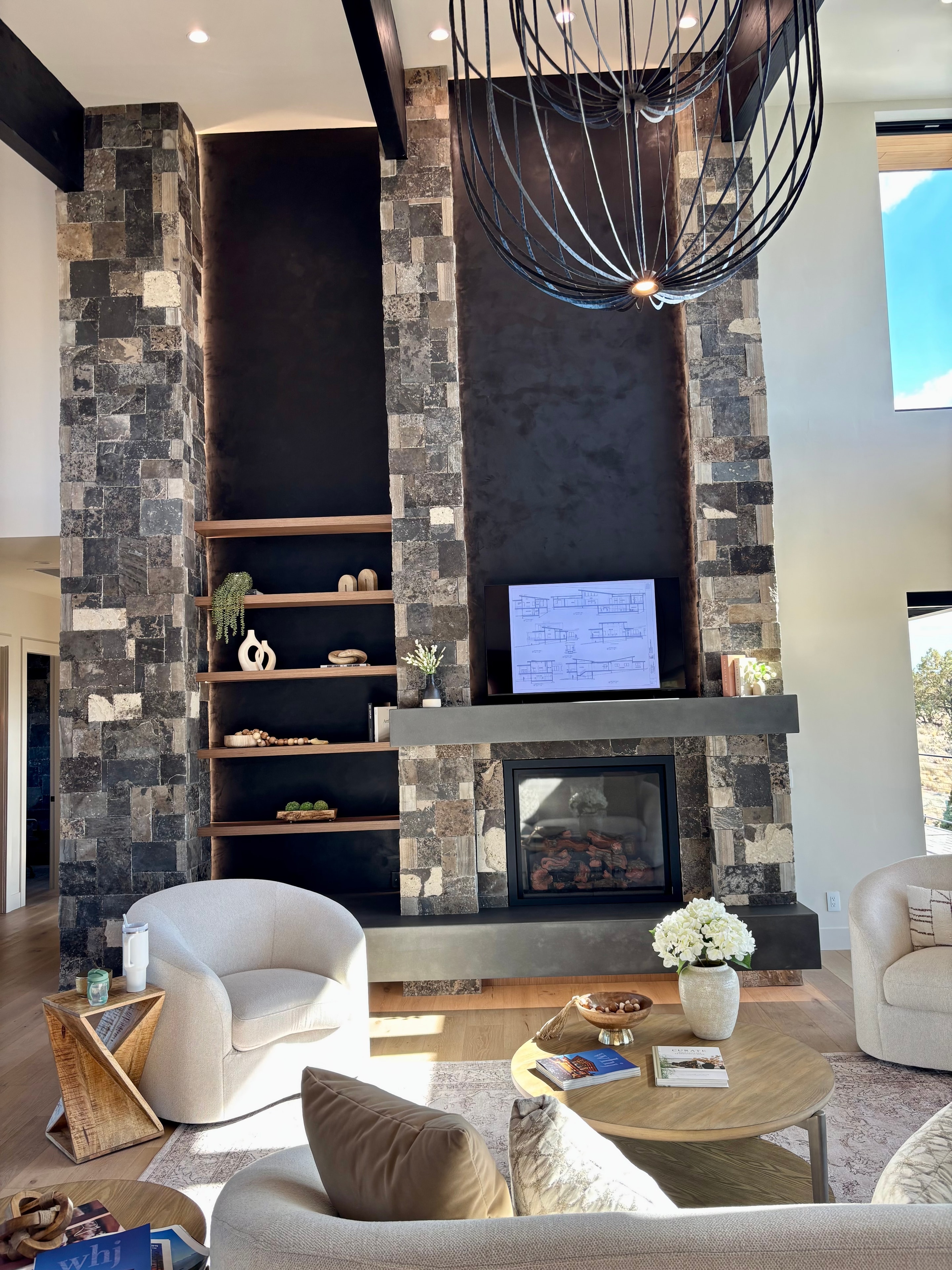 Two-Story Stone Fireplace with Built-Ins