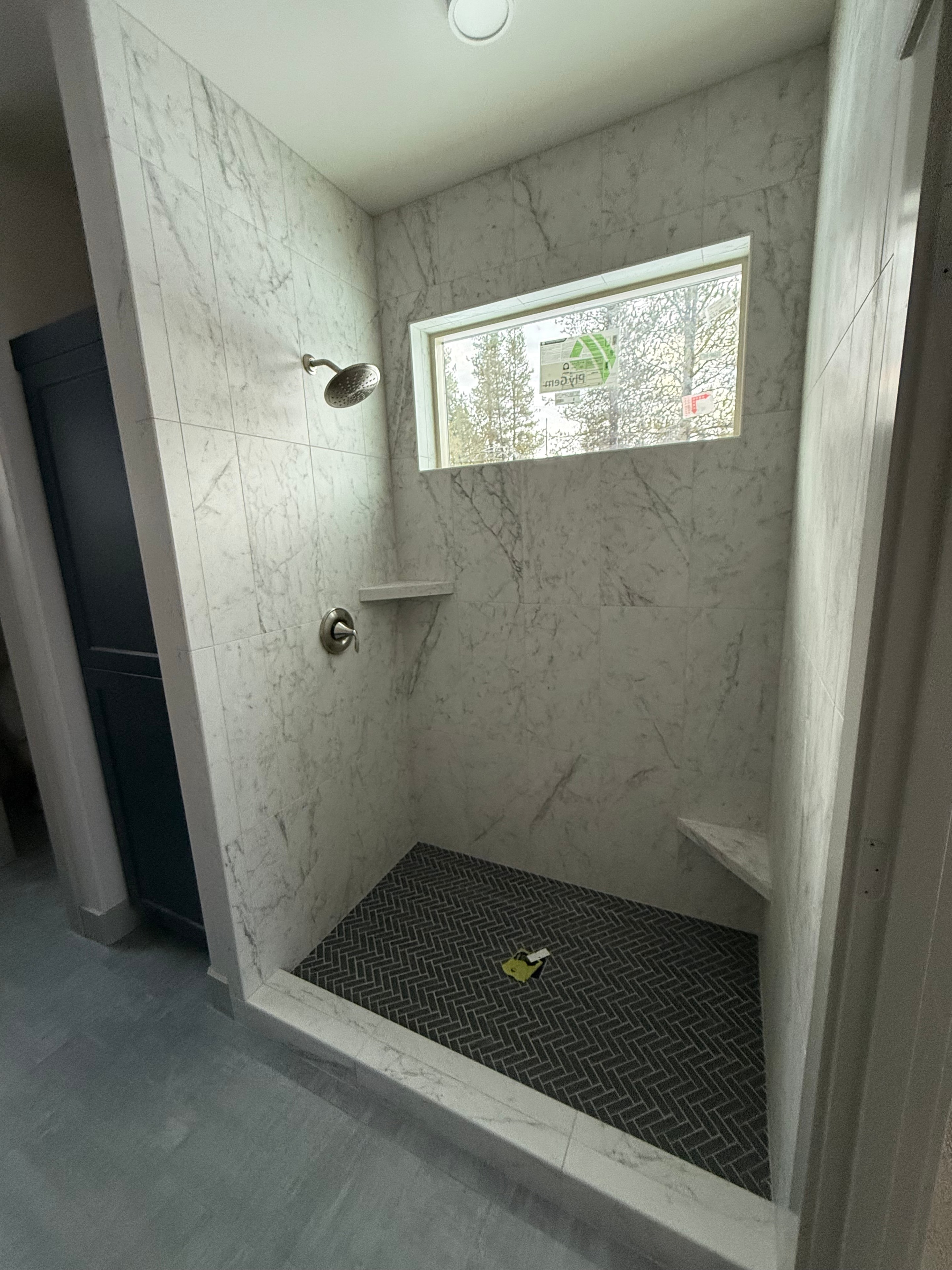 Marble Shower with Herringbone Floor